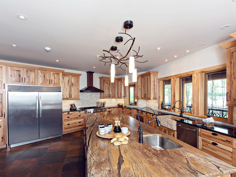 beaver-mountain-log-homes-kuyahoora-lodge-cedar-hybrid-home-kitchen-island-1