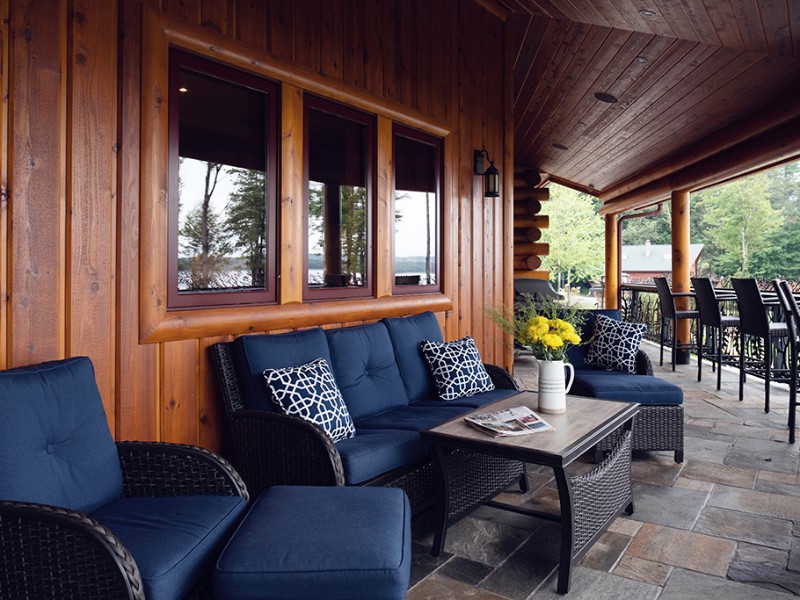 beaver-mountain-log-homes-kuyahoora-lodge-cedar-hybrid-home-lodge-cedar-log-home-porch-1